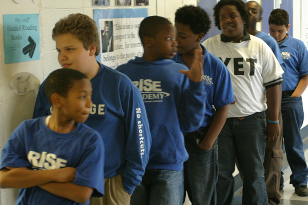 Students waiting in line to go to the restroom at RISE